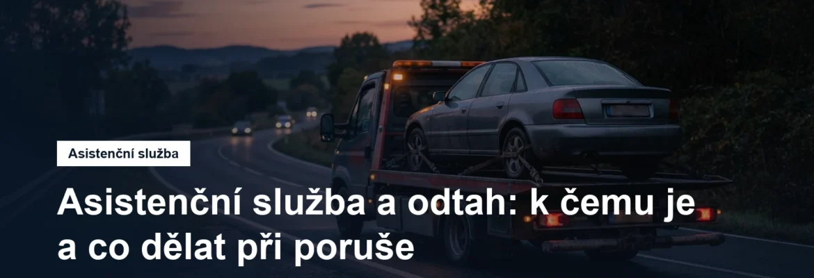 Odtahový vůz s naloženým autem u silnice