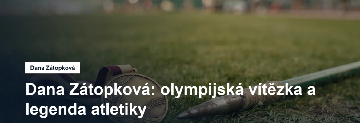 Zlatá medaile a oštěp na trávníku