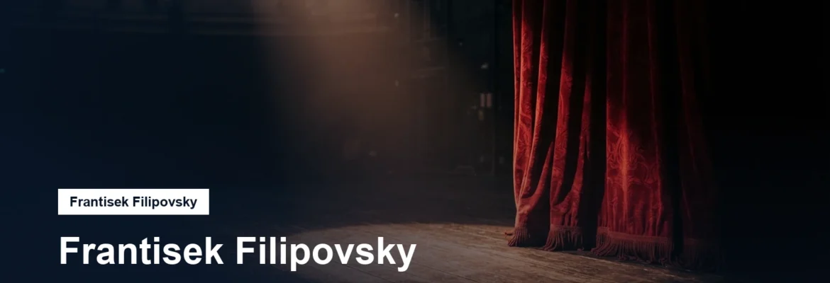 Divadelní jeviště s reflektorem a rudou oponou