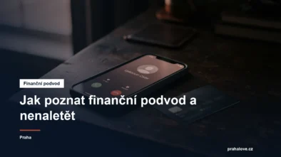 Mobil s neznámým hovorem a platební karta na stole