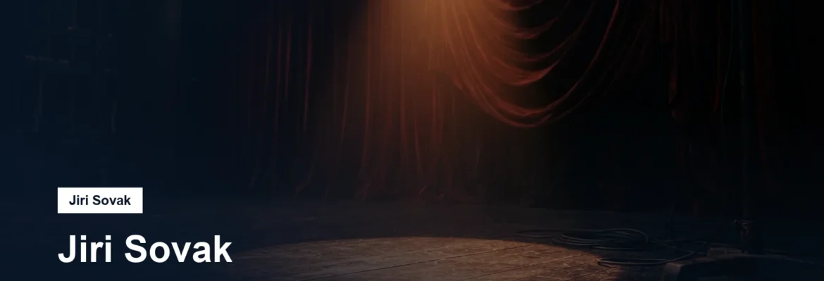 Divadelní jeviště s reflektorem a rudou oponou
