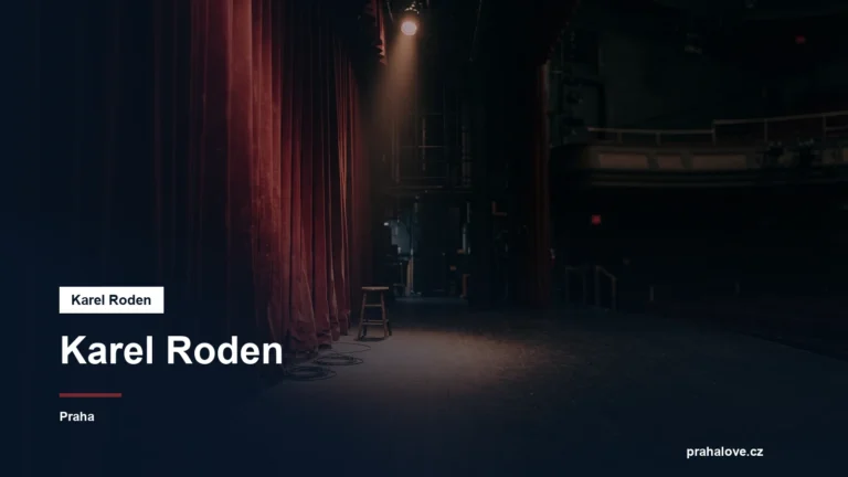 Divadelní jeviště s reflektorem a rudou oponou