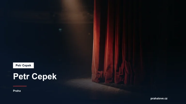 Divadelní jeviště s reflektorem a rudou oponou