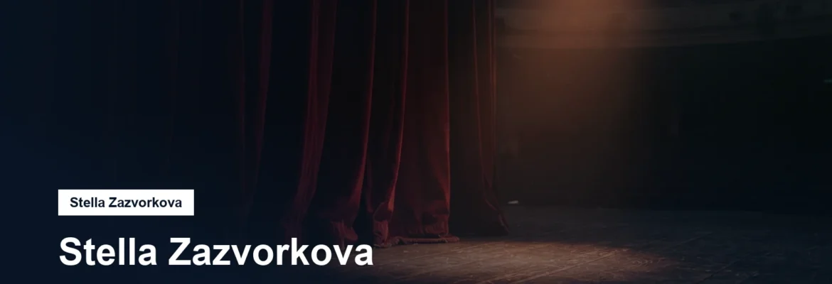 Divadelní jeviště s reflektorem a rudou oponou