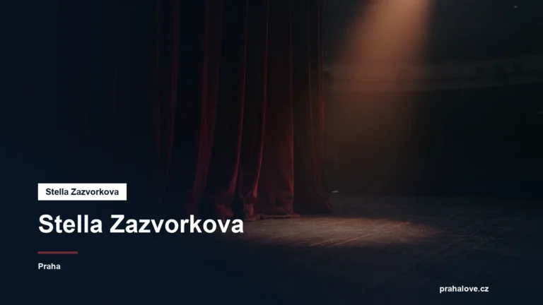 Divadelní jeviště s reflektorem a rudou oponou