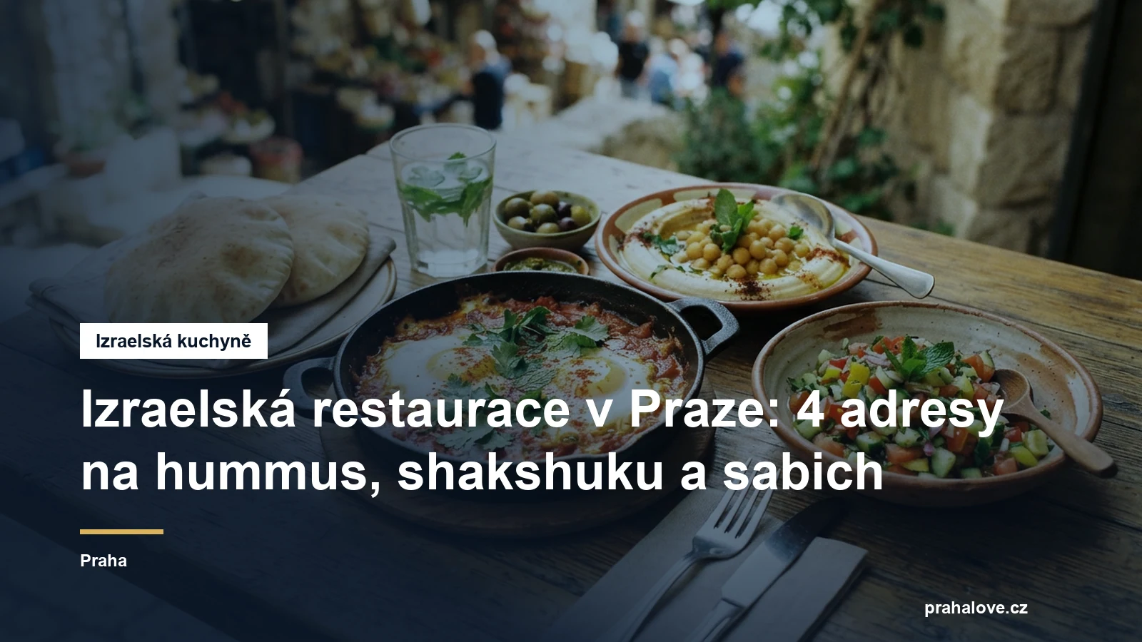 Shakshuka, hummus a pita na stole