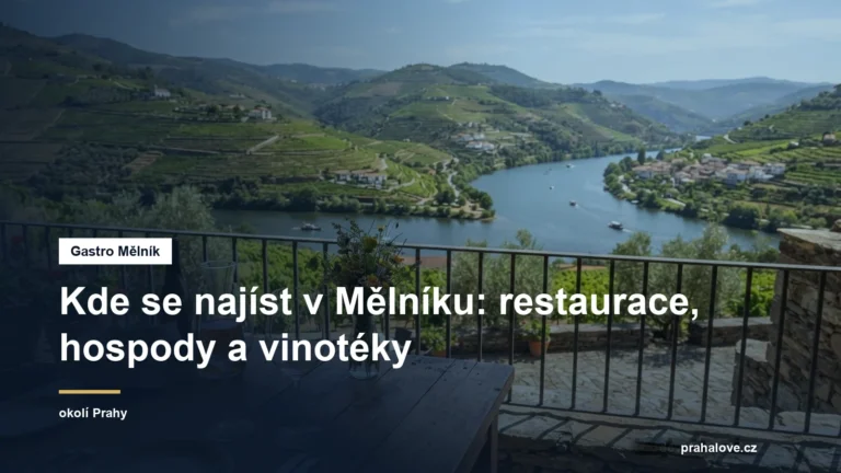 Prostřený stůl s vínem na terase nad řekou
