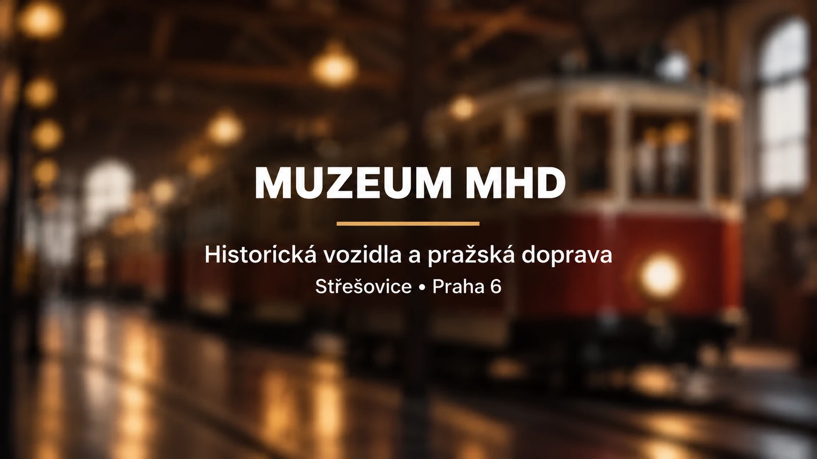 Muzeum MHD: bílý název a zlatá linka na rozostřeném pozadí historické tramvaje ve vozovně