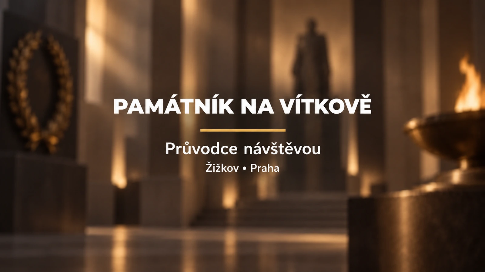 Památník na Vítkově: bílý titulek se zlatou linkou na rozostřeném pozadí monumentálního sálu